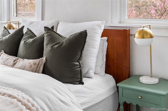 bedroom with a textured wall