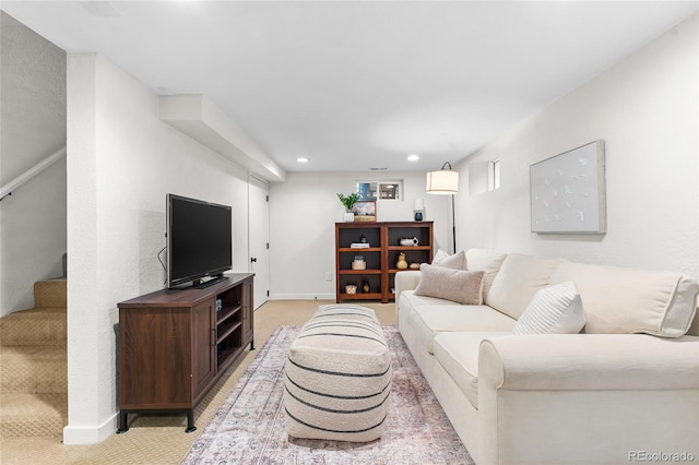 living room featuring light carpet, recessed lighting, baseboards, and stairs