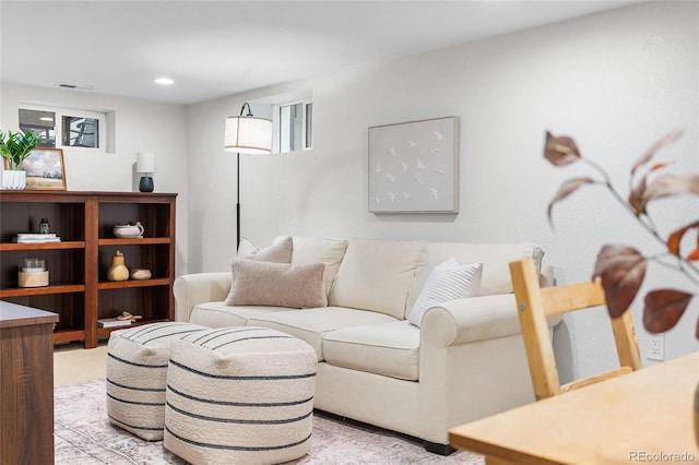 living room with light colored carpet