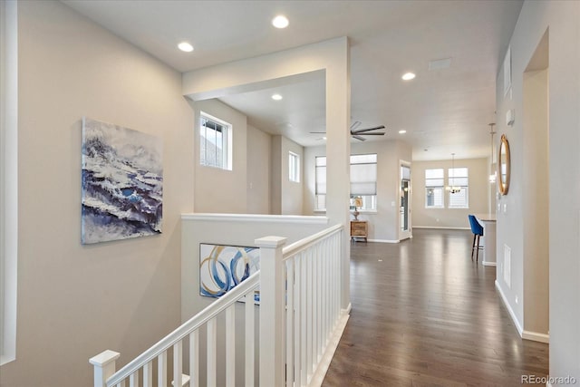 3336 Goodyear St, Castle Rock, CO 80109 - hallway with dark wood-type flooring, recessed lighting, and an upstairs landing