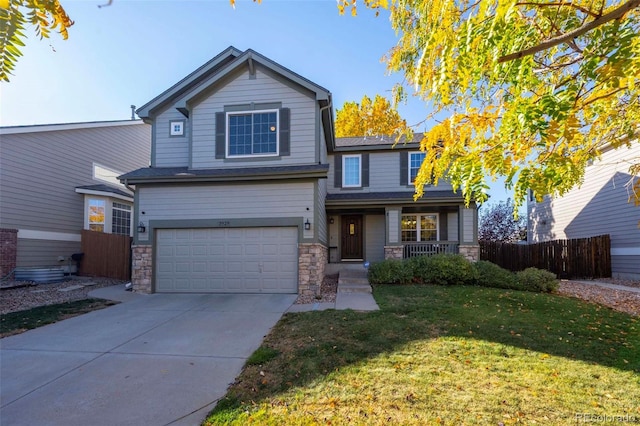 front facade with a front yard and a garage