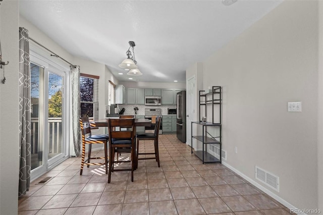 view of tiled dining space