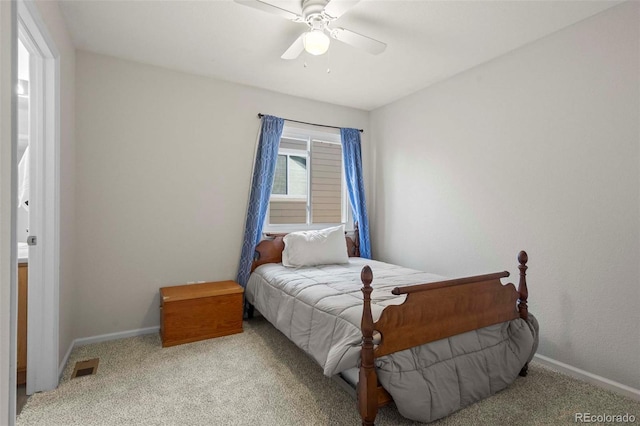 carpeted bedroom with ceiling fan