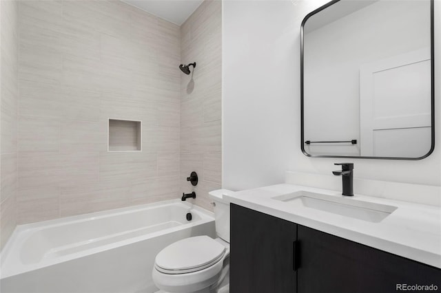 full bathroom with  shower combination, vanity, and toilet