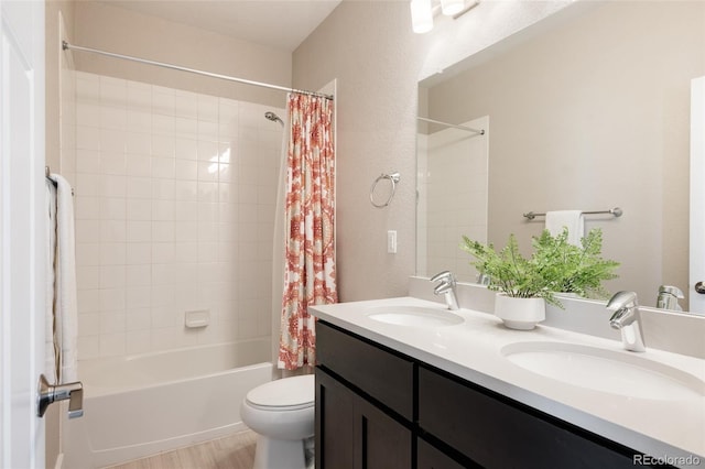 full bath with a sink, toilet, shower / bathtub combination with curtain, and double vanity