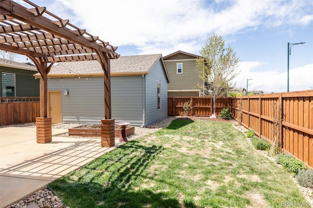 view of yard with a patio, a pergola, and a fenced backyard