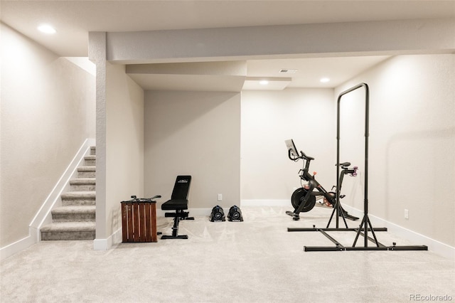 exercise room featuring baseboards, carpet flooring, and recessed lighting