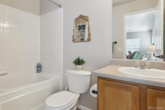 ensuite bathroom featuring shower / washtub combination, toilet, vanity, and ensuite bath