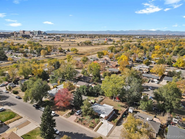 birds eye view of property featuring a mountain view