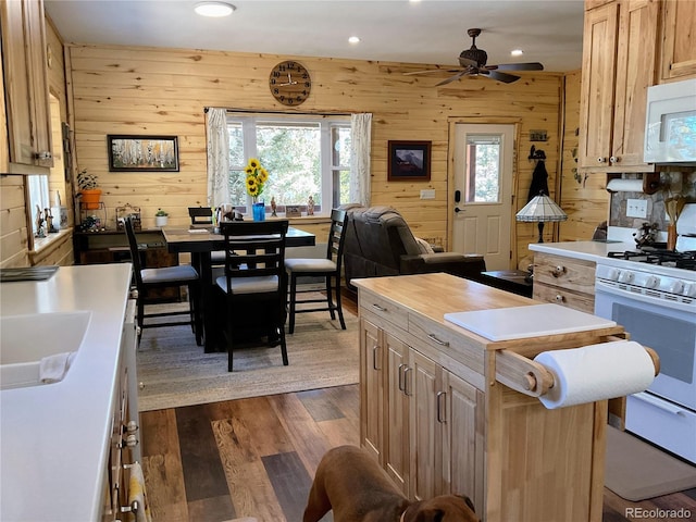 2945 Forbes Park Rd, Fort Garland, CO 81133 - kitchen featuring white appliances, a ceiling fan, recessed lighting, dark wood finished floors, and wooden walls