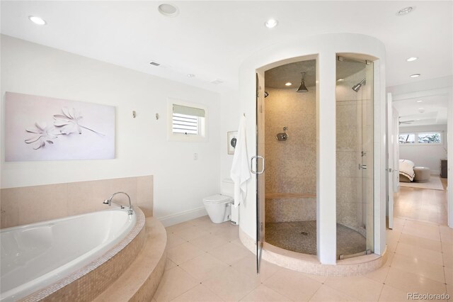 full bath with a stall shower, a garden tub, baseboards, recessed lighting, and toilet