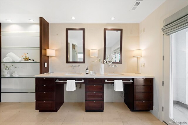 full bathroom with double vanity, tile patterned flooring, and recessed lighting