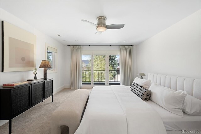 carpeted bedroom featuring access to outside and baseboards