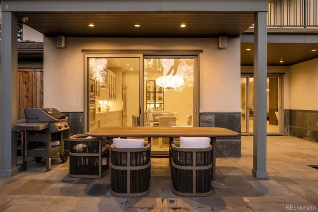 bar area with stone tile flooring and recessed lighting