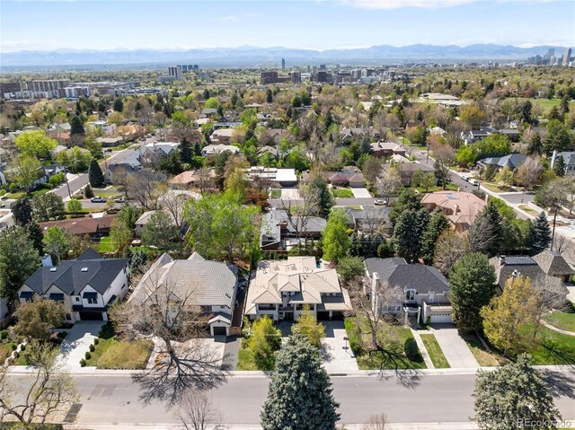 aerial perspective of suburban area featuring a mountain backdrop