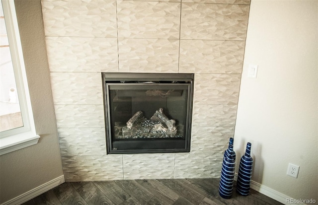 details with a tile fireplace