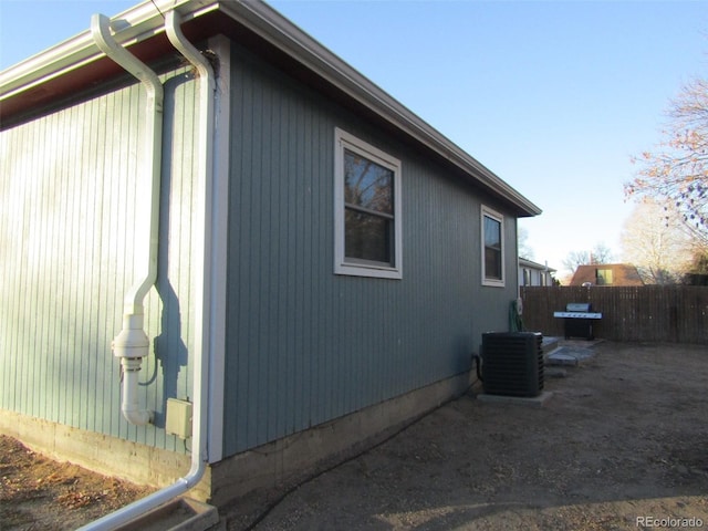 view of home's exterior featuring cooling unit