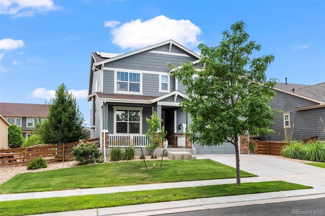 9957 Quintero St, Commerce City, CO 80022 - craftsman-style house with a porch, concrete driveway, a garage, and roof mounted solar panels