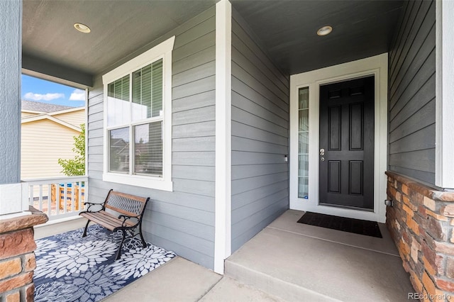 9957 Quintero St, Commerce City, CO 80022 - view of exterior entry with a porch