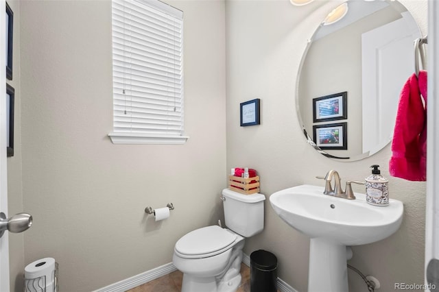 9957 Quintero St, Commerce City, CO 80022 - bathroom with toilet and baseboards