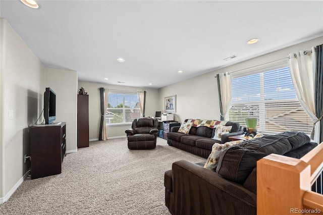 9957 Quintero St, Commerce City, CO 80022 - carpeted living room featuring baseboards and recessed lighting