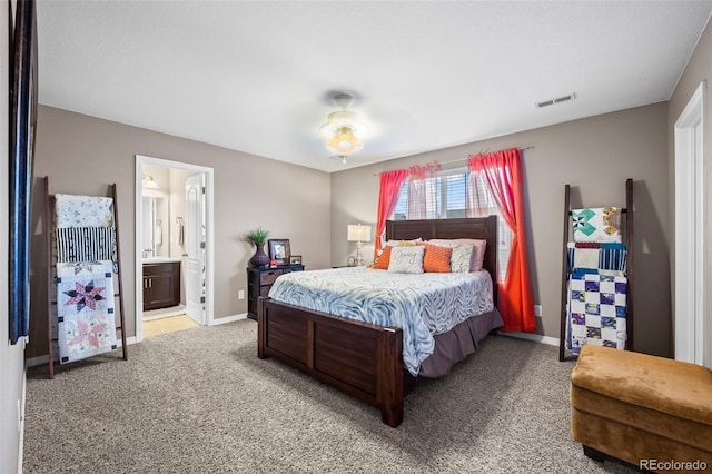 9957 Quintero St, Commerce City, CO 80022 - bedroom with light colored carpet and ensuite bathroom