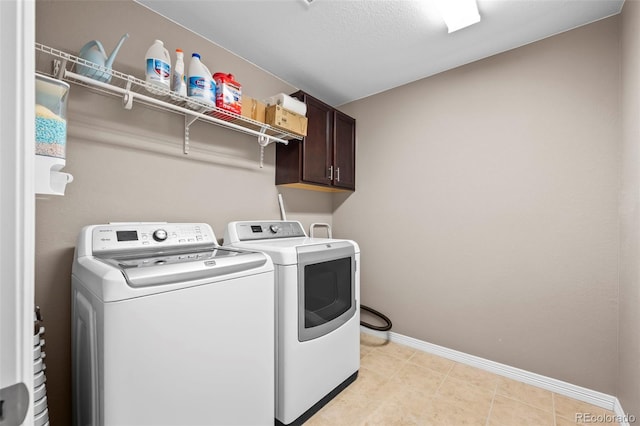 9957 Quintero St, Commerce City, CO 80022 - washroom featuring cabinet space and independent washer and dryer