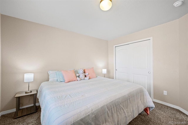 carpeted bedroom with a closet