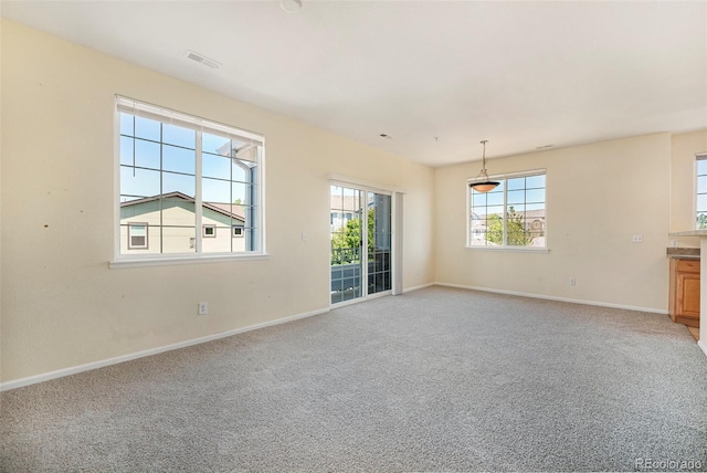 5255 Memphis St Unit 315, Denver, CO 80239 - empty room with light colored carpet and baseboards