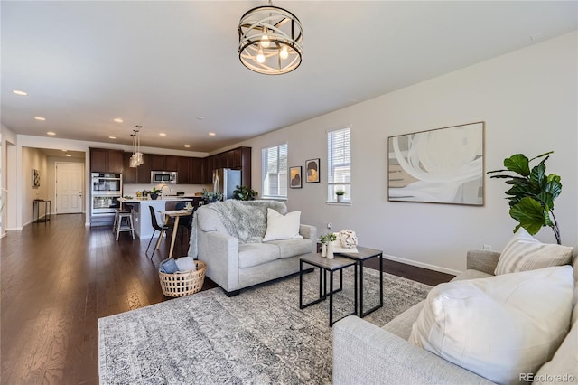 living room featuring dark hardwood / wood-style floors