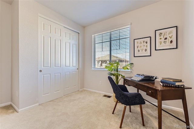 view of carpeted home office