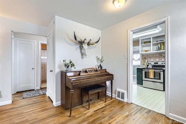 miscellaneous room featuring light hardwood / wood-style flooring