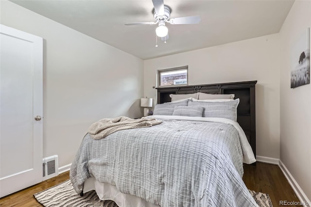 bedroom featuring ceiling fan and hardwood / wood-style floors