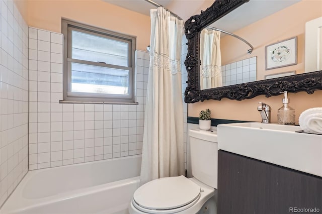 full bathroom featuring vanity, toilet, and shower / bath combo