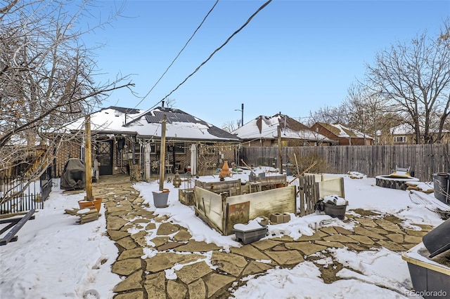 view of yard layered in snow