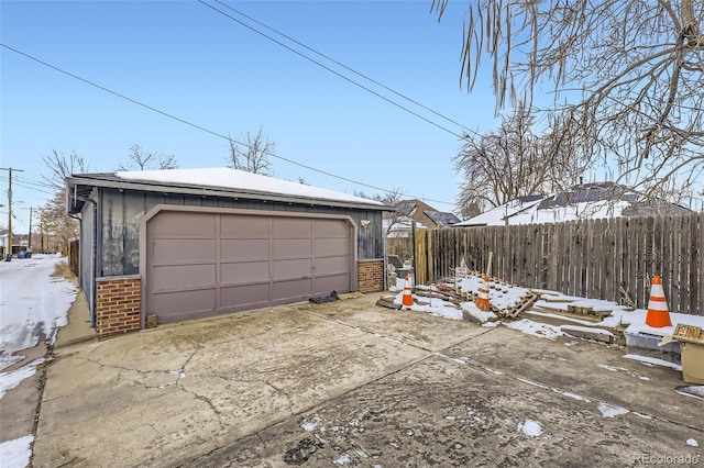 view of snow covered garage