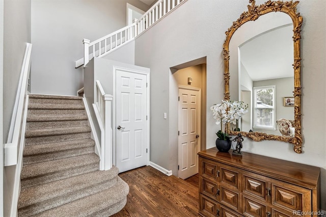 staircase featuring hardwood / wood-style flooring