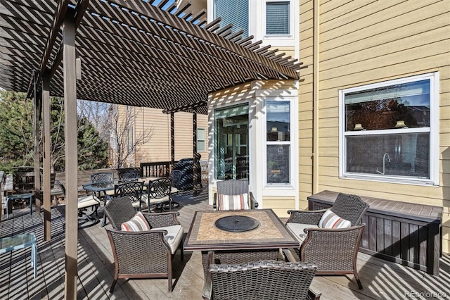 deck featuring an outdoor hangout area and a pergola