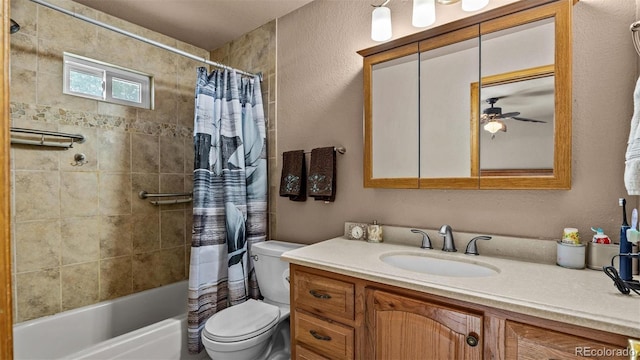 3102 Pine Cone Ct, Grand Junction, CO 81504 - bathroom featuring toilet, vanity, shower / bath combo, and a ceiling fan