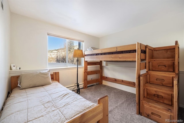 bedroom featuring carpet floors and a baseboard radiator