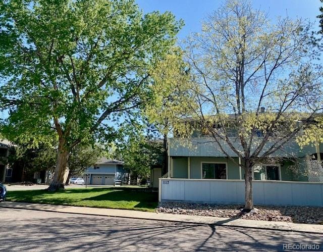 1117 Elysian Field Dr Unit B, Lafayette, CO 80026 - view of front of home featuring a fenced front yard