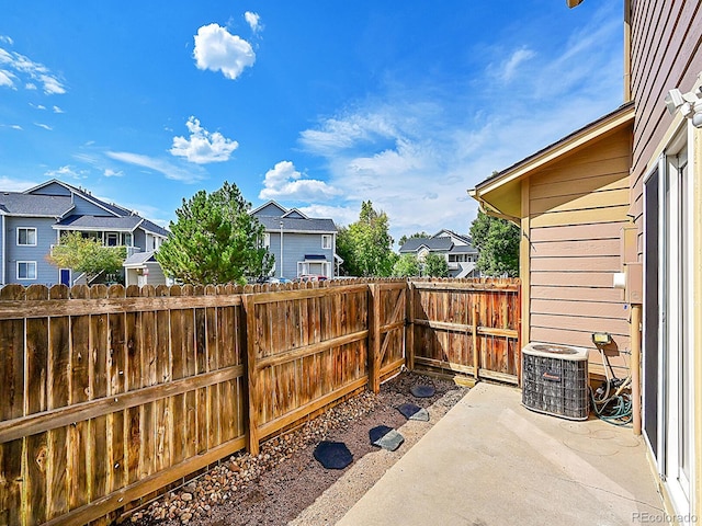 view of patio with central AC