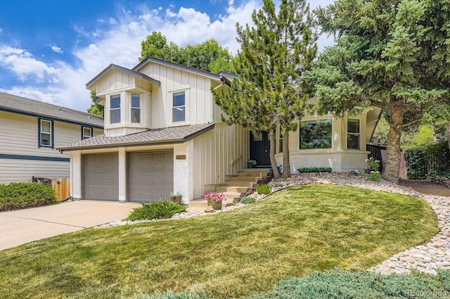7727 Maroon Peak, Littleton, CO 80127 - view of front of house featuring a garage, board and batten siding, brick siding, and driveway