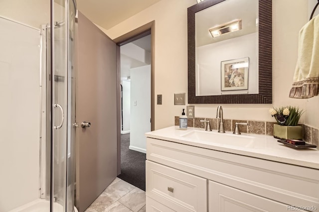 7727 Maroon Peak, Littleton, CO 80127 - full bath with vanity, marble finish flooring, and a stall shower
