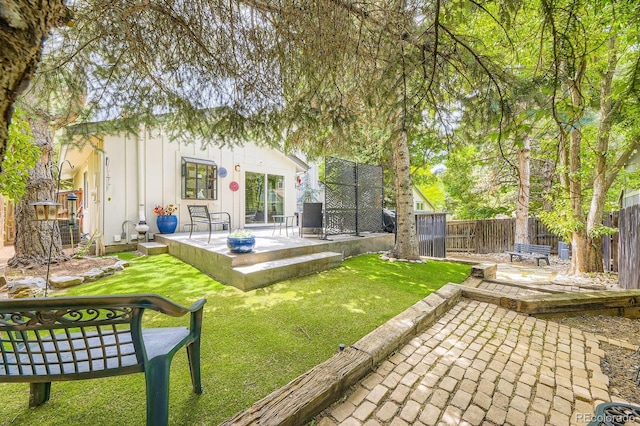 7727 Maroon Peak, Littleton, CO 80127 - fenced backyard featuring a patio