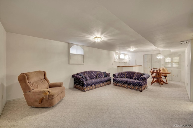 carpeted living room with plenty of natural light