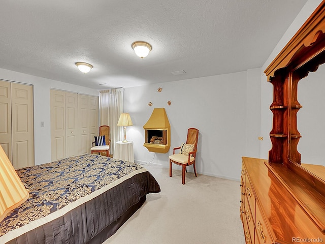 6769 W 70th Ave, Arvada, CO 80003 - carpeted bedroom featuring a textured ceiling