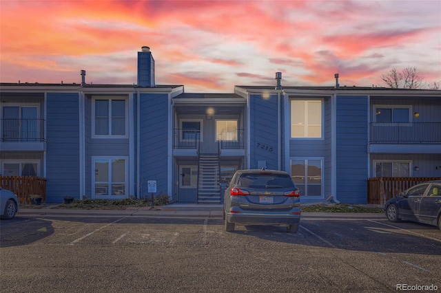 view of outdoor building at dusk