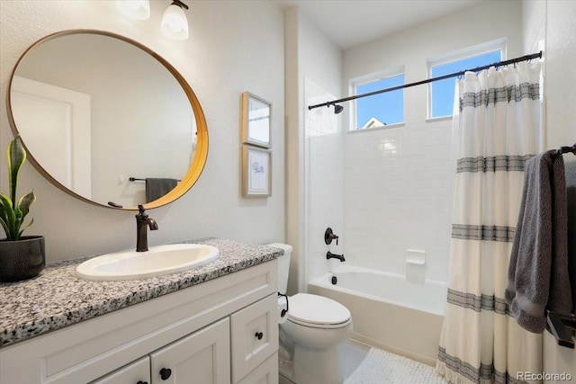 full bathroom featuring shower / bathtub combination with curtain, vanity, and toilet