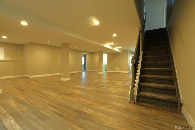 basement featuring light wood-type flooring